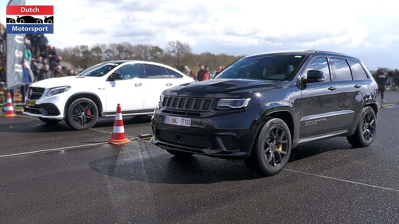 Watch a 1000HP Jeep Trackhawk Drag Race Like a Boss