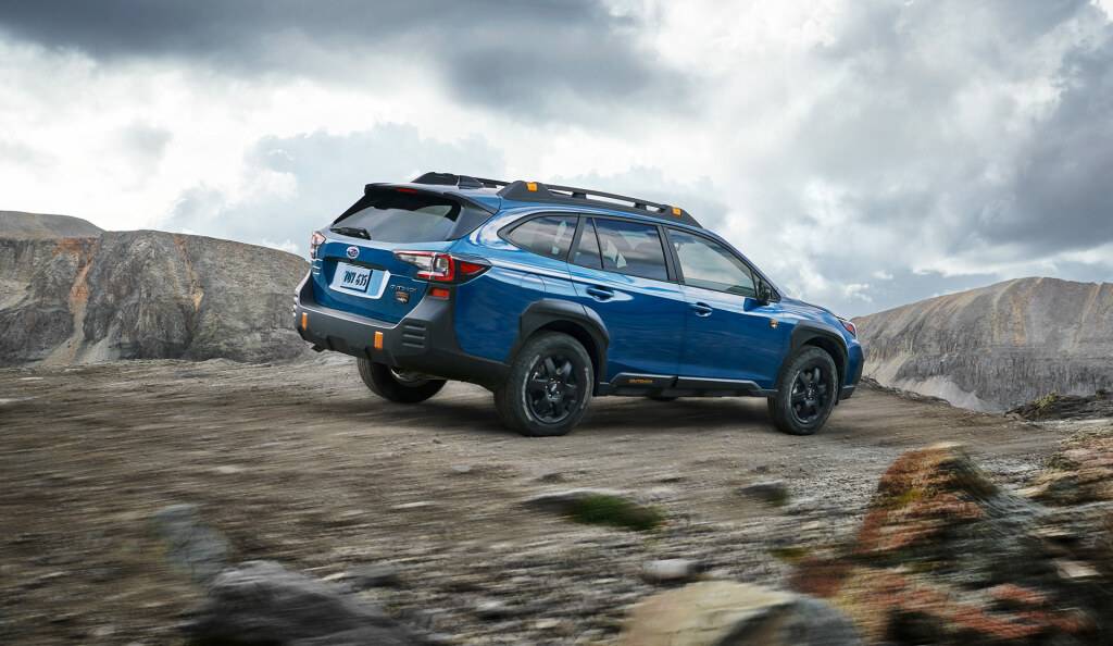 2023 Outback suv Rearview Fast Moving Gravel Trail